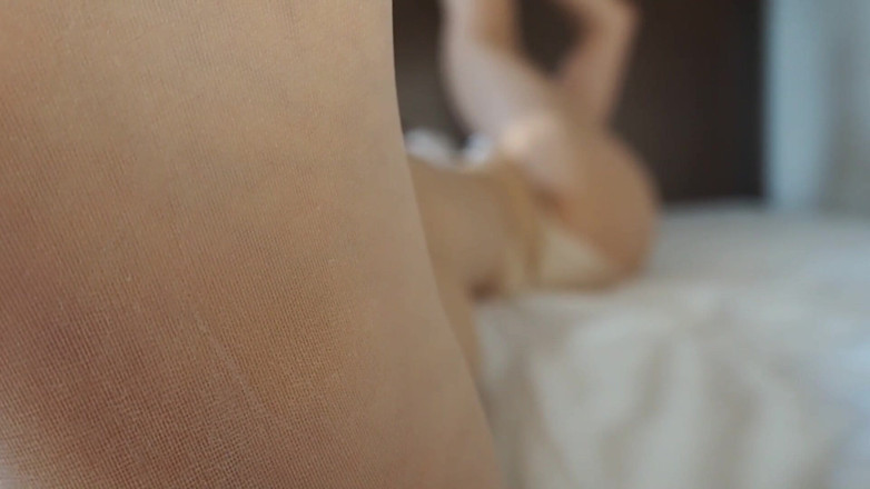 Mayumi Kanzaki: Stretching in Pantyhose on the Bed