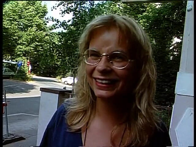 Lucky Cooch: Sexy woman talks in front of camera