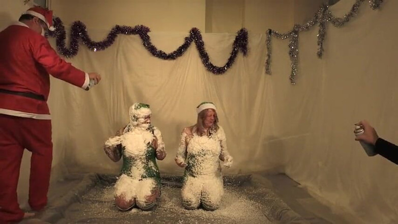 Gunked up girls: Christmas elves Lola and Jodie snow