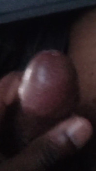 Masturbating