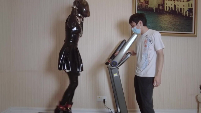 Aisan girl bondage: Mz24 - a Girl Bound to a Treadmill with Metal Restraints...