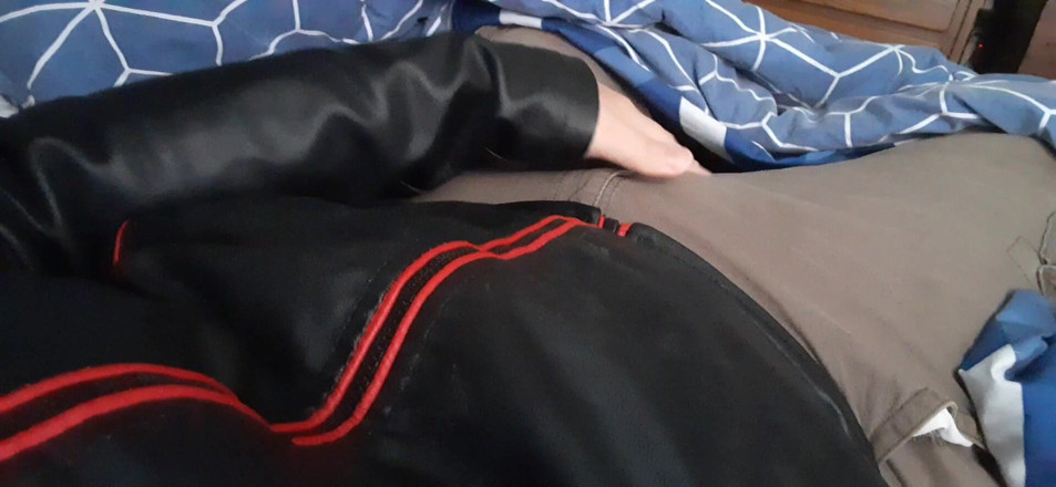Rusty Sunnybrook: Edging in Red and Black Leather Jacket