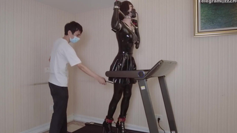 Aisan girl bondage: Mz24 - a Girl Bound to a Treadmill with Metal Restraints...