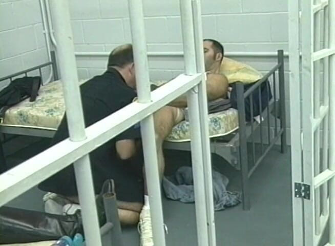 Bareback TV: Policeman fucking a hairy hunk in the custody