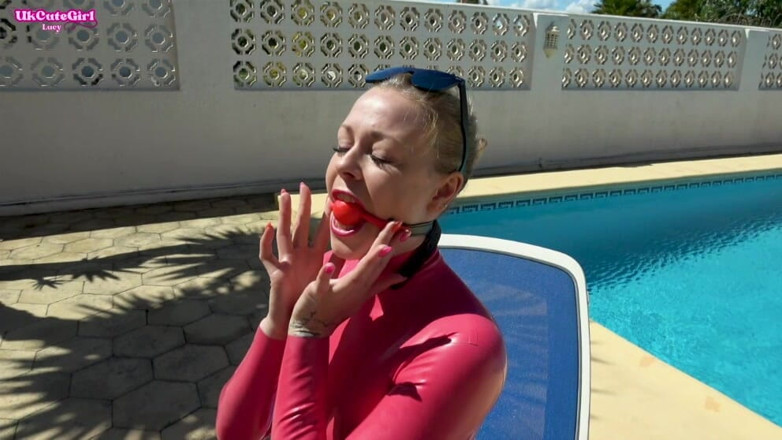 UKCuteGirl Lucy Lauren: Sunbathing Gagged in Latex - Shiny Messy Drool Whore