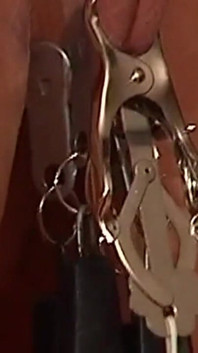 Chained Cougar Gets Her Pussy Heavily Clamped and Weighted