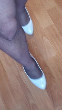 Walking in My High White Shiny Stilettos