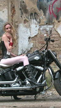 Skinny blonde on a bike