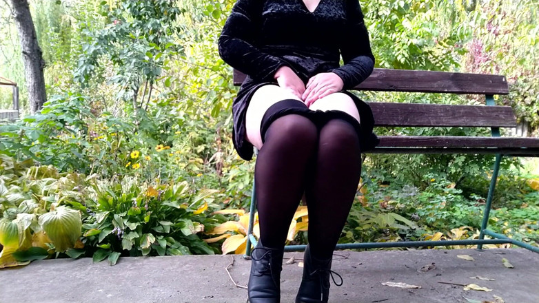 Elena: Peeing with legs spread wide on a bench in an...