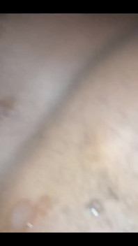 Masturbating