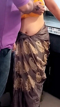 A Hungry Husband and a Sexy Wife Have Sex in the Kitchen at Home
