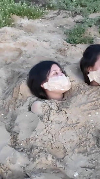 Buried by the Beach Bitches!