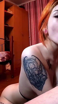 Passionate blowjob of a gorgeous redhead beauty