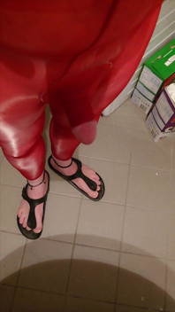 Pissing at Home in Red Legging with Penis Sleeve