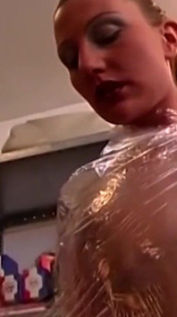 Plastic Wrapped Slut Gaping Wide Through Shiny Film