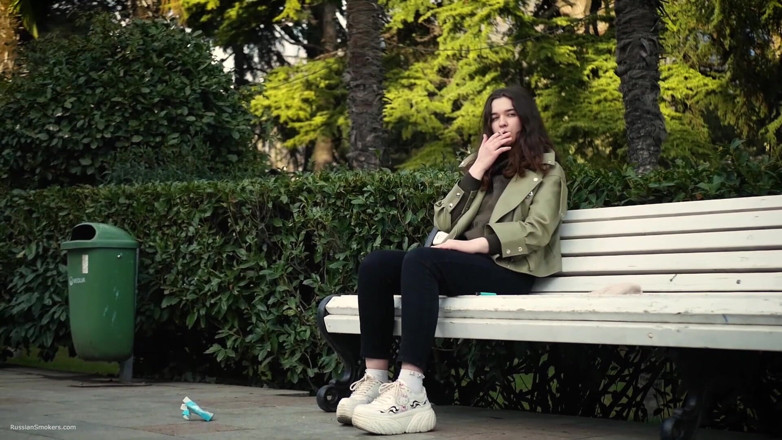 Russian Smokers: Young Brunette Is Taking an Unhurried Stroll with Allwhite 120mm Cigarette