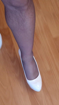 Walking in My High White Shiny Stilettos