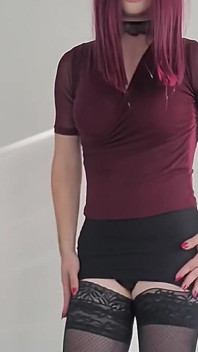 Crossdresser in Sexy Miniskirt and High Heels