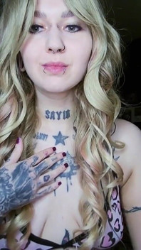 Sexy Alternative Blonde Drinking and Burping