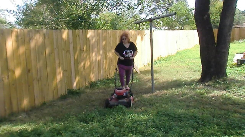 BBW nurse Vicki adventures with friends: Nurse Vicki Mowing Grass dressed then topless