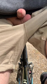 Young boy publicly flashing dick on the bike to strangers