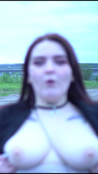 A Beauty with a Tattoo Shows Her Tits