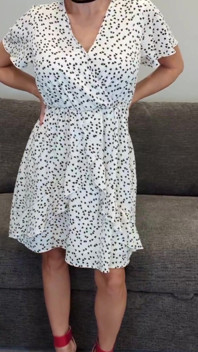 Sadie in a White Dress with Hearts and Red Heels