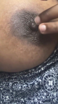 Playing with Her Nipple