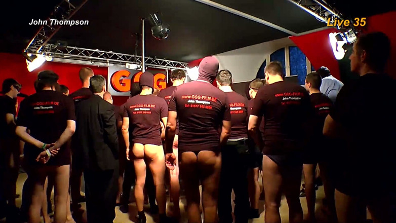 GGG John Thompson Studio: Redhead Slut Gets Massive Bukkake Facial From 20 Guys