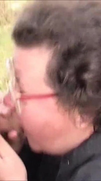 Old BBW chick sucks his cock outdoor in close up