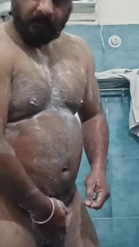 Indian Nude Daddy Enjoying a Hot Shower and Showing off His Wet Body