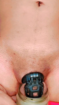 Standing Pissing in Chastity Cage