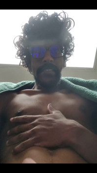 Masturbating