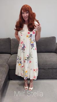A Redhead in a Dress