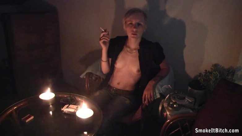 Smoke it bitch: Cute and sexy blonde with pierced face smokes her cigar...