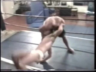 Gays Case: Muscular hunks throw and pin each other in wrestling ring