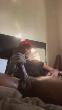 Masturbating