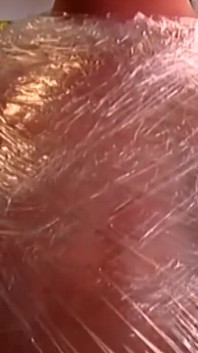 Plastic Wrapped Slut Gaping Wide Through Shiny Film