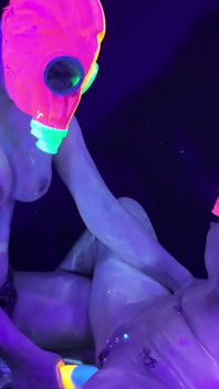 Neon Rave Girl on Girl Dildo Play