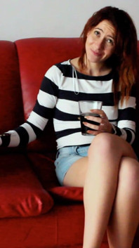 Skinny Redhead Smoking on a Couch