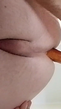 Anal masturbation with the sausage