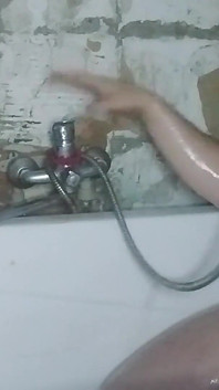 Camera in the Bathroom and a Girl with a Big Ass Is Peeing, Very Sexy