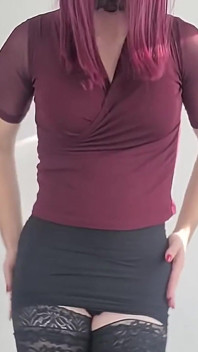 Crossdresser in Sexy Miniskirt and High Heels
