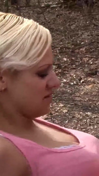 Mature blonde woman in fishnet fucked on the log