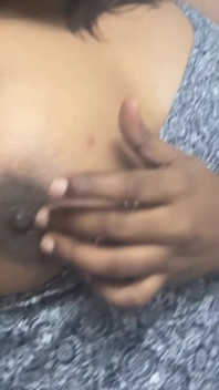 Playing with Her Nipple