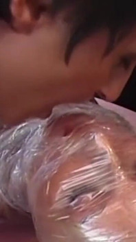 Plastic Wrapped Mature Slut Licked and Facesat by Horny Couple