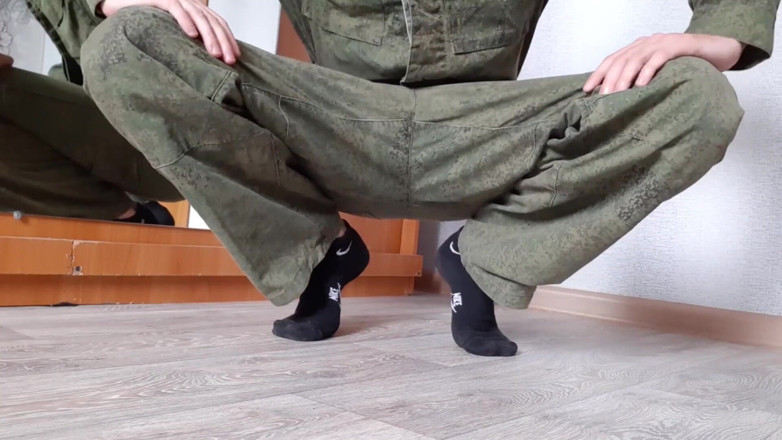 AlexRusFun: A Russian soldier in military uniform and dirty socks jerks...