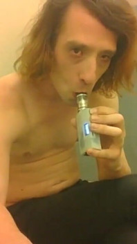 Topless Transgirl Trying Vape Tricks