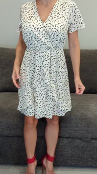 Sadie in a White Dress with Hearts and Red Heels