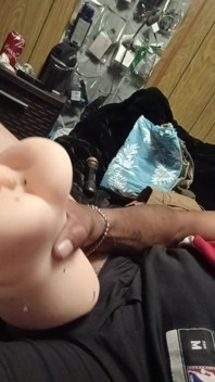 Masturbating